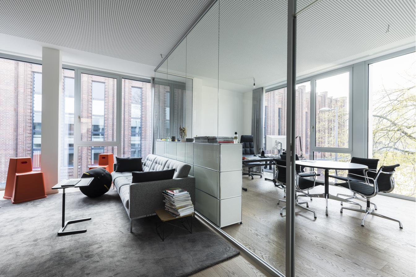 Modern Xient office with a lounge and meeting area